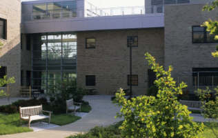 The Academic Village Building (V Building) is completed and opens.