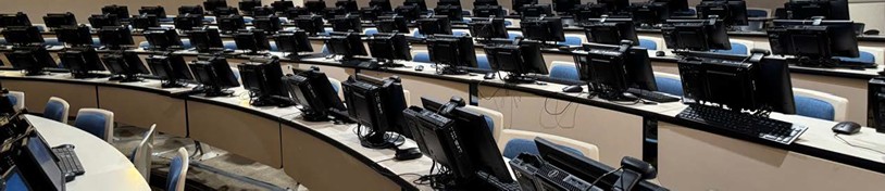 Computer Lab Photo of an empty tiered seating computer lab.