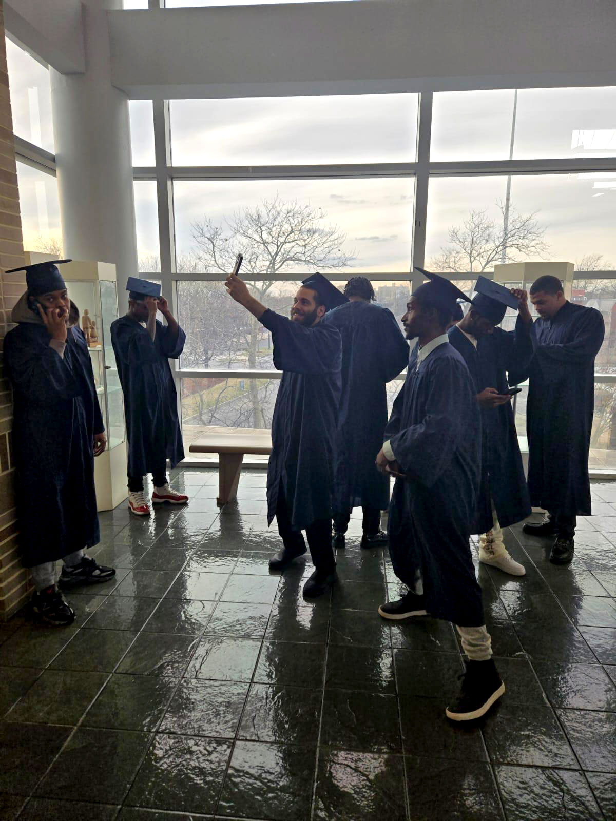 CFA graduates taking photos